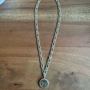 Elegant Silver Chain Necklace with Round Medallion